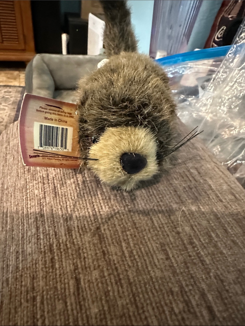 An original collectible scoozie mini pet otter plush